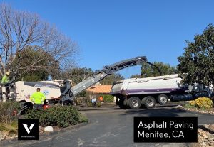 Asphalt crew paving parking lot in Menifee