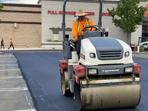 Paving Roller compacting new asphalt