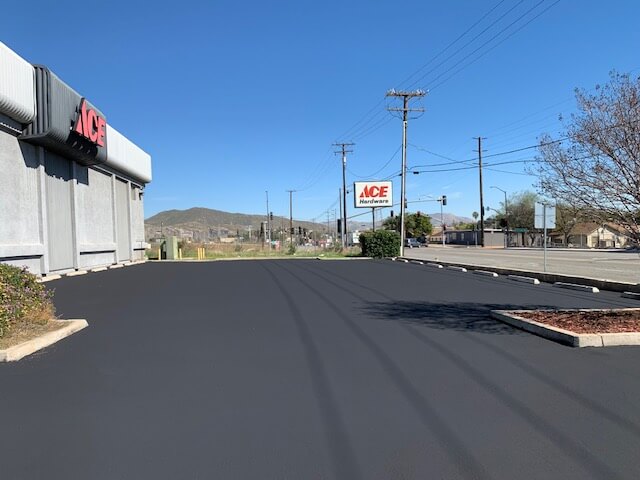 Seal coated parking lot in strip mall