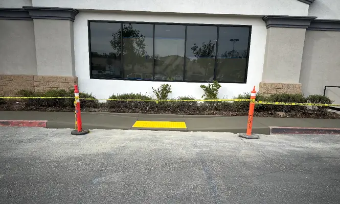 dump truck being loaded with asphalt millings