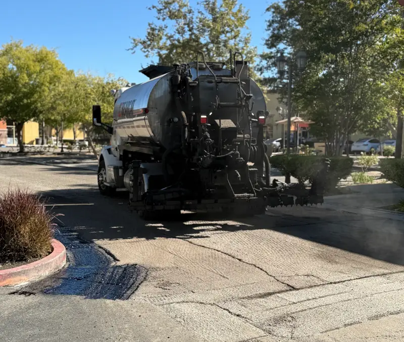 tack truck applying tack to newly milled area