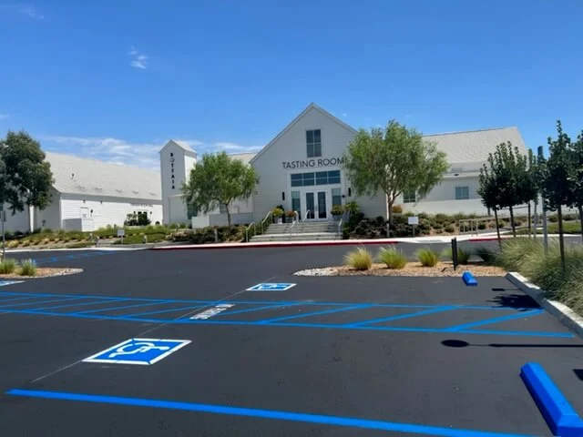 Parking lot with new sealcoating and striping