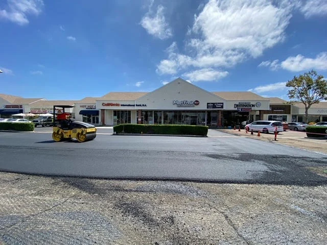 Strip Mall with new asphalt